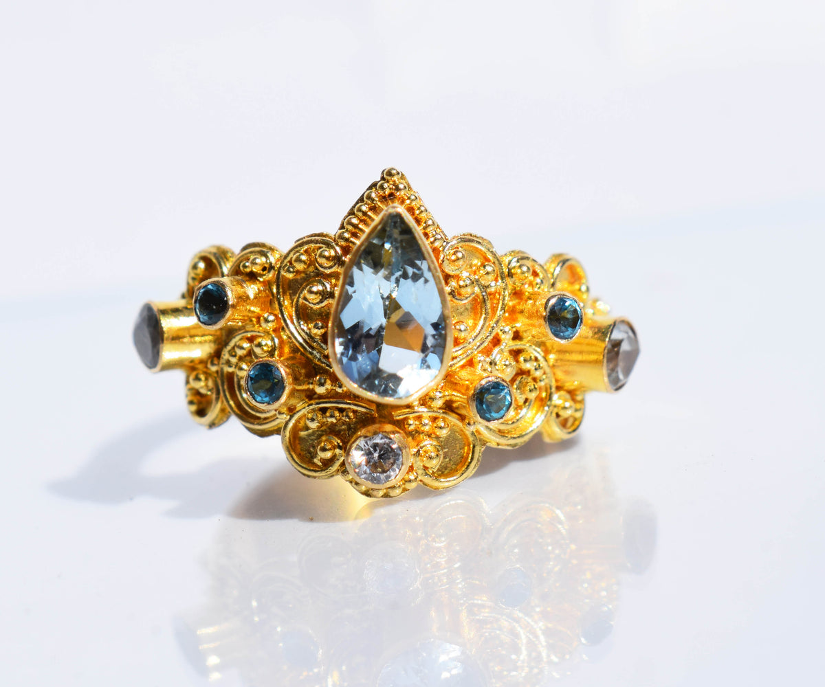 Anillo gold Magic Lotus Aguamarina